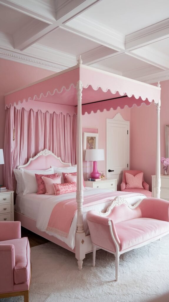 A bedroom with a white and pink theme. The room features a pink canopy bed with white posts. There is a white dresser and a pink chair in the room. The walls are painted pink, and the ceiling has white crown molding. There is a white lamp on the nightstand and a pink lamp on the chair. The floor is covered with a white rug.