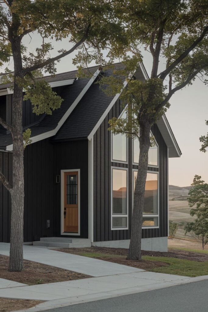 Dark Siding with Tall Windows and Wood Door