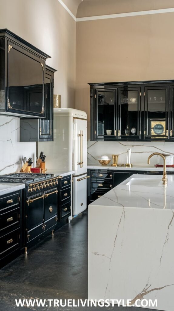 A kitchen featuring black cabinets, white marble countertops and backsplash, and a white refrigerator.