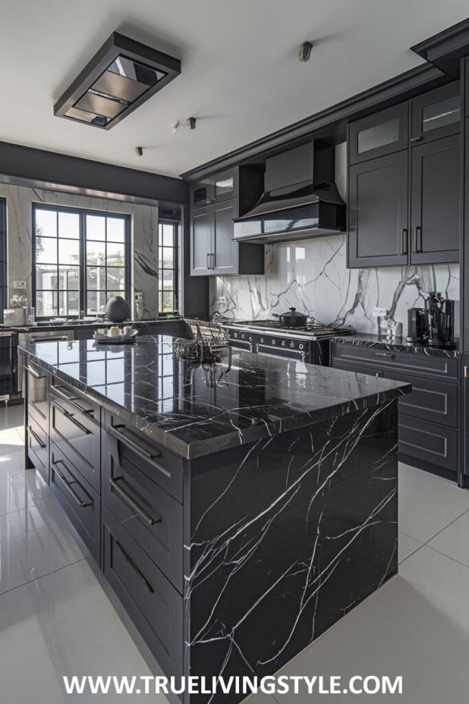 A kitchen featuring gray cabinets, a black marble island, and white tile floors.