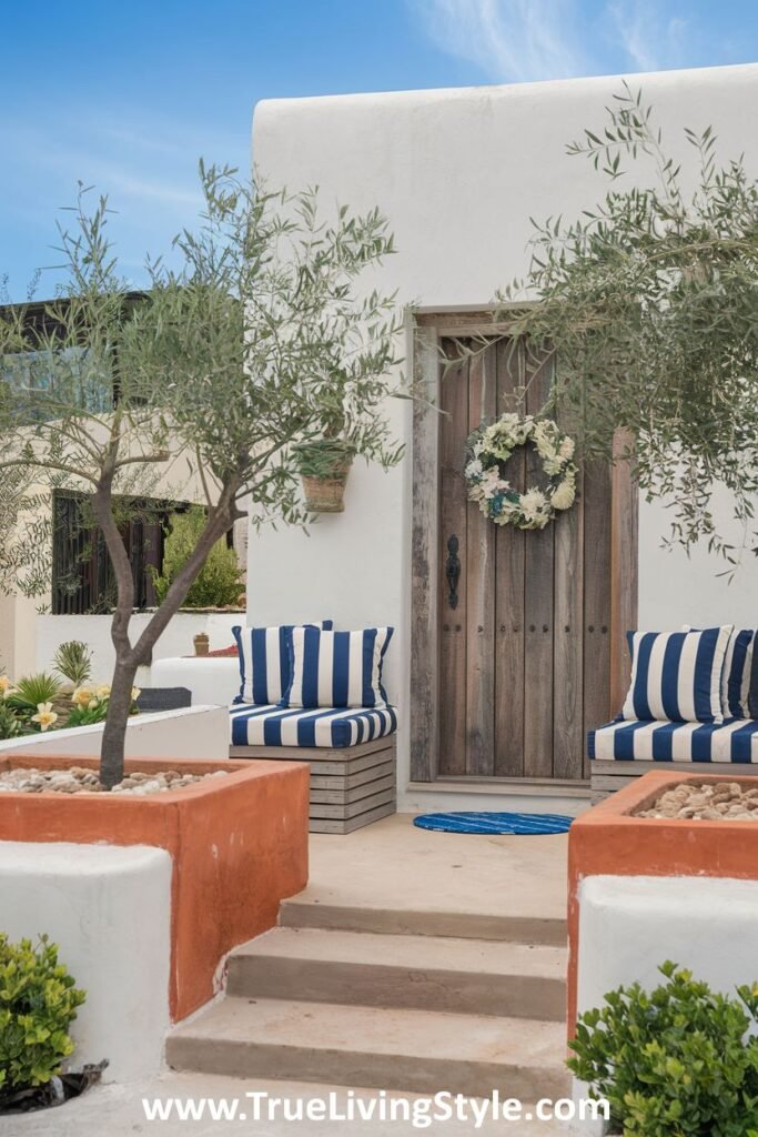 A unique porch featuring southwestern seating and olive trees.