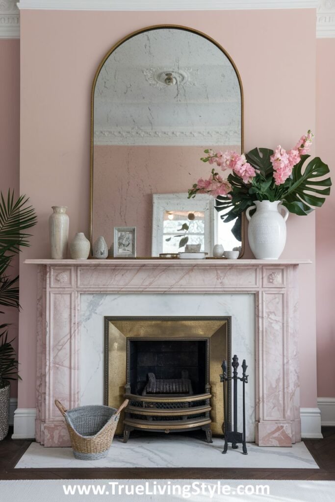 A pink mantel with simple accessories like white vases and decorative objects.