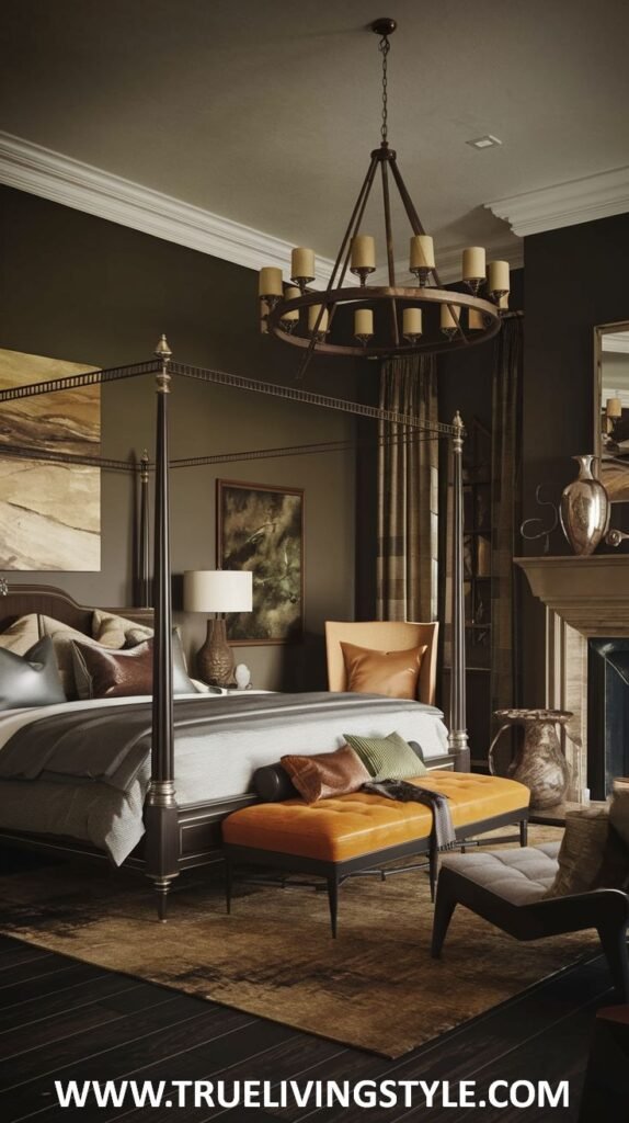 A dark earthy bedroom includes a four-poster bed with dark wood, neutral and brown bedding, an orange leather bench at the foot of the bed, a dark brown armchair, a fireplace, and a rustic chandelier hanging from the dark ceiling.