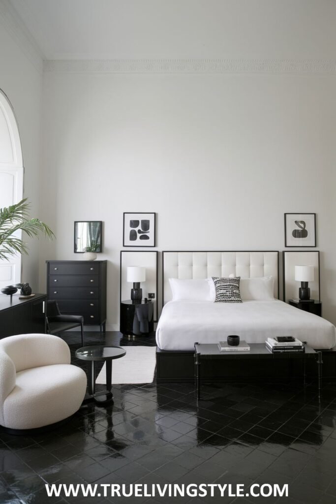 Black tile flooring adds a dramatic look to a minimalist bedroom.