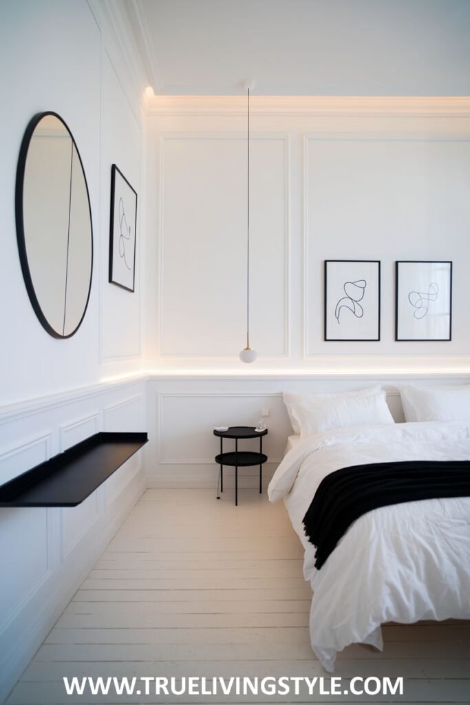 Minimalist black and white wall art adds sophistication to the bedroom.