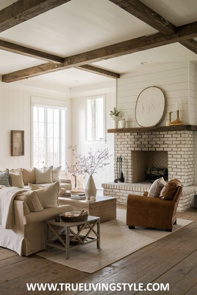 A balanced living room with exposed beams and a whitewashed fireplace.