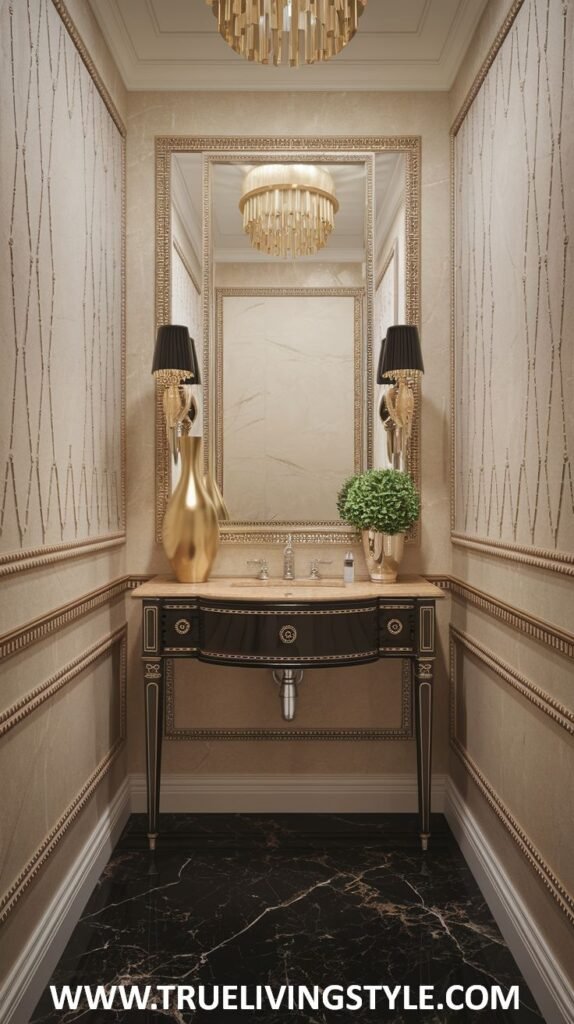An ornate and traditionally styled luxury powder room with patterned beige wallpaper, a large mirror framed in gold with elegant sconces, a dark wood vanity with gold detailing and a black countertop, and a polished black marble floor.