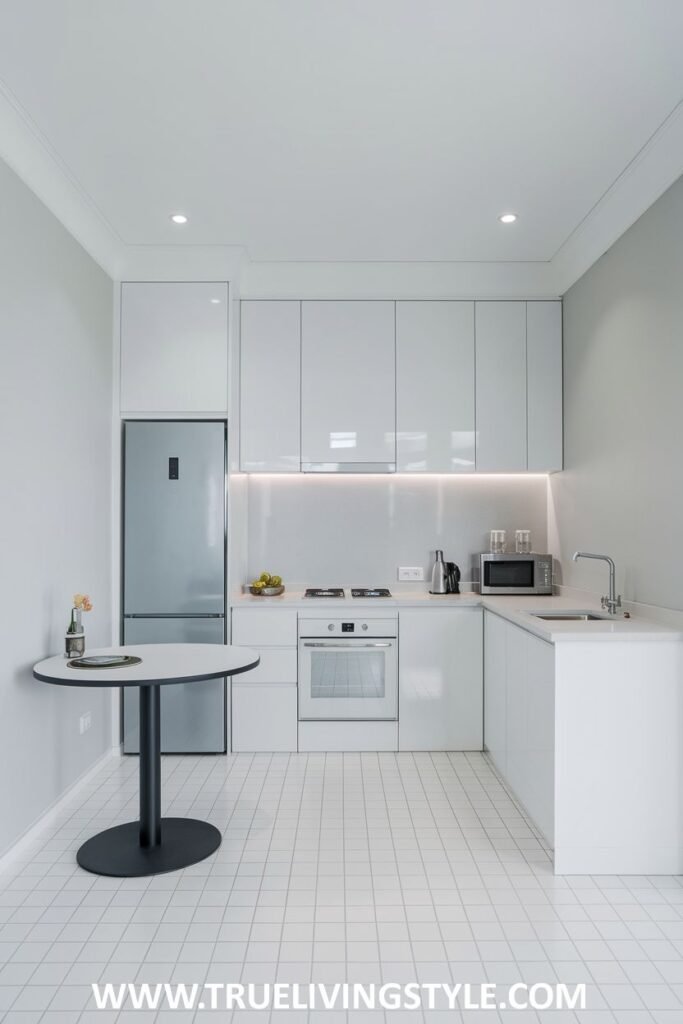 A kitchen with all-white appliances.