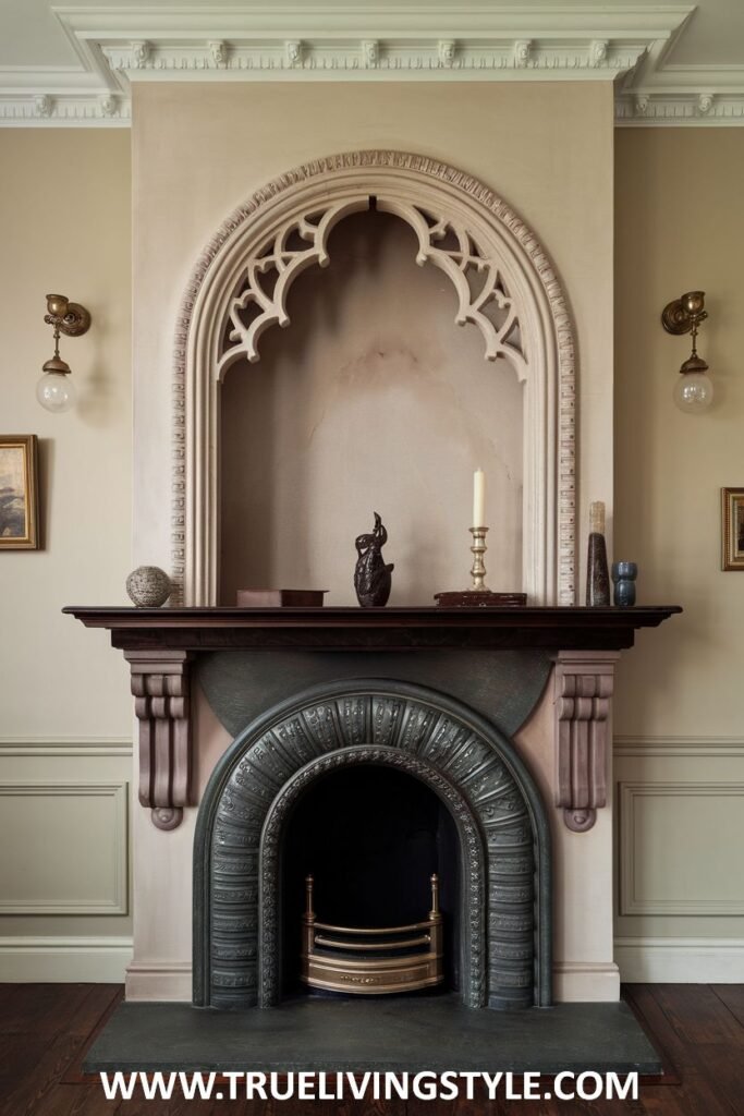 An elegant light-colored stone victorian fireplace with a refined Gothic arch detail above the mantel.